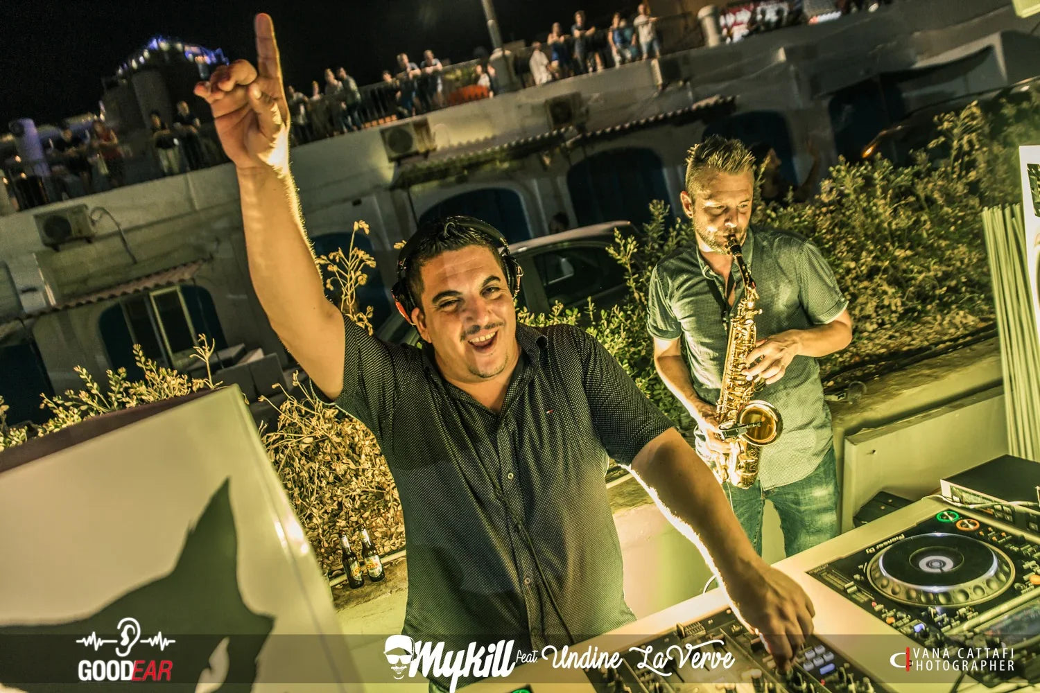 DJ and saxophonist performing live at outdoor night event with crowd, ideal for weddings and parties in Malta