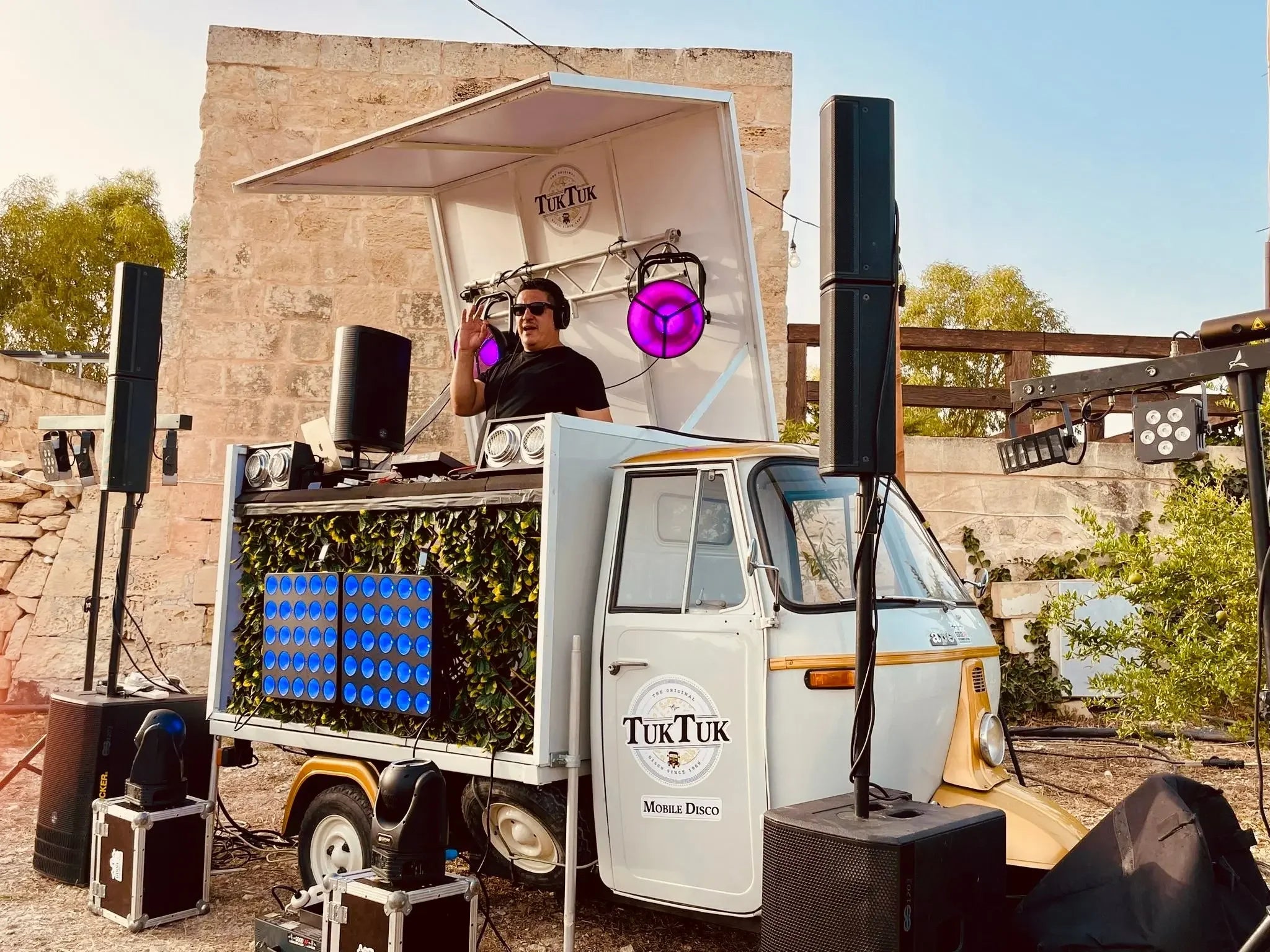 DJ in TukTuk Mobile Disco with speakers and lights for outdoor events in Malta